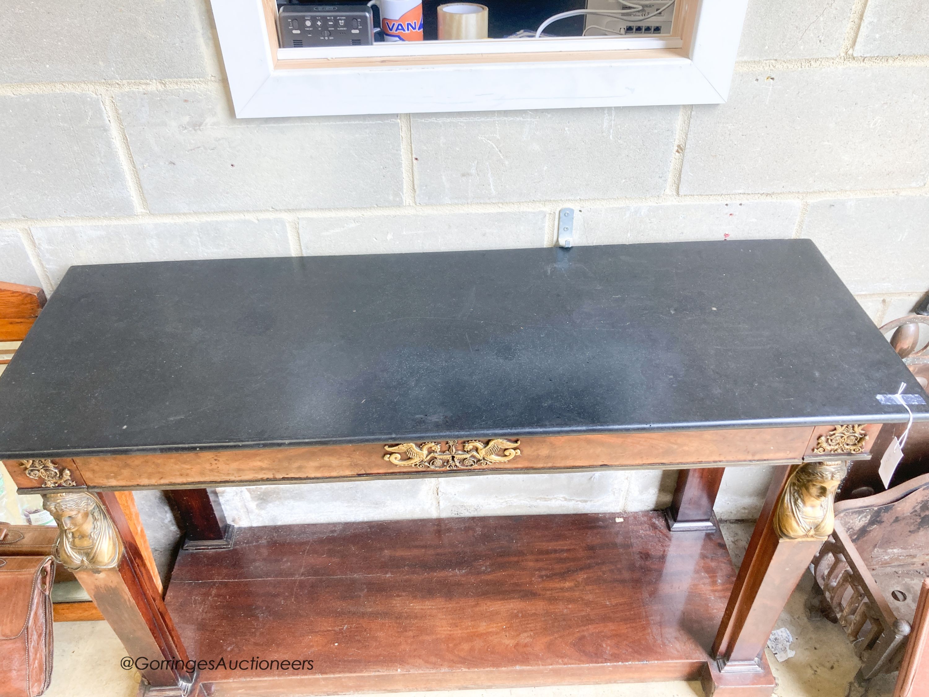 An Empire style marble top console table, width 132cm, depth 45cm, height 84cm